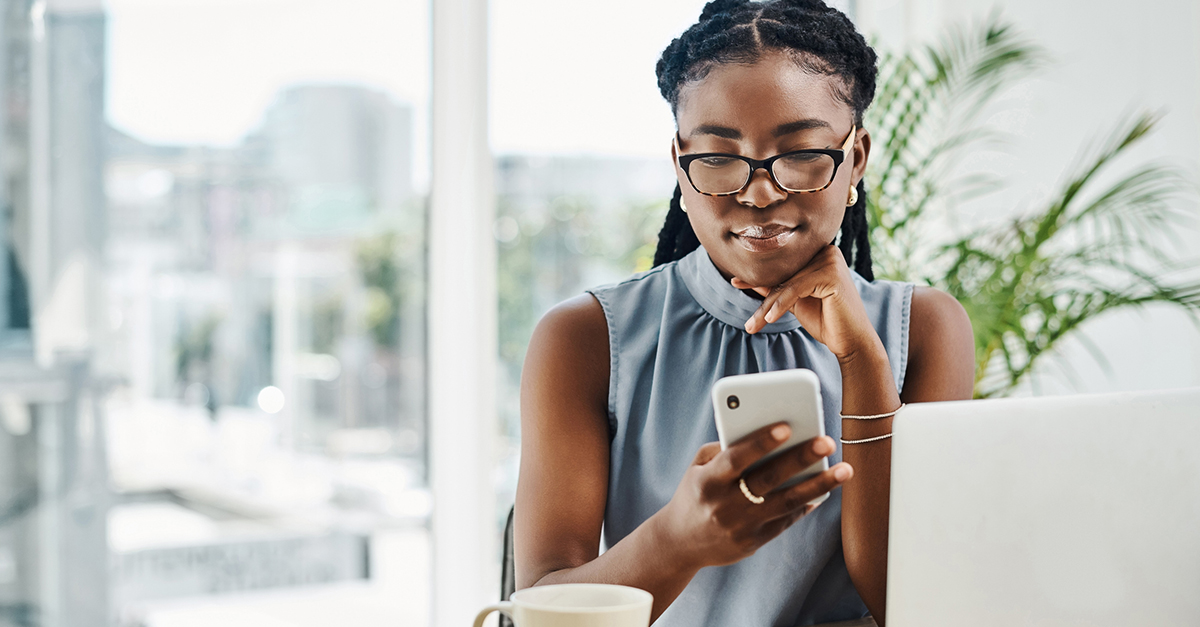 Agent looks through her phone to contact past clients